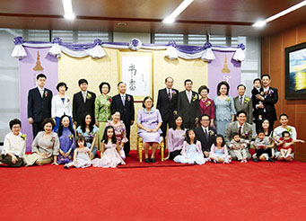 Preyanee and her family with H.R.H. Princess Sirindhorn of Thailand
