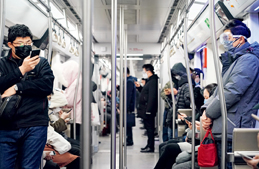 Passengers wear masks and goggles en route to work on Beijing Subway Line 6 during the morning traffic rush on February 12. Various precautions have been taken to curb the virus spread in communities, factories, companies and shopping malls.
