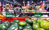 Locals shop in a Carrefour in Beijing on February 14.