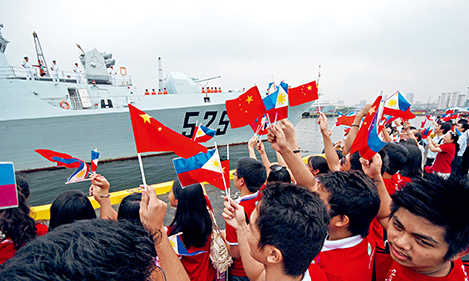 April 13, 2010: Filipinos welcome the Chinese navy at the South Harbor of Manila. A fleet consisting of missile frigate Ma’anshan, missile frigate Wenzhou and comprehensive supply ship Qiandaohu arrived for a five-day goodwill visit after completing an escort mission in the Gulf of Aden.