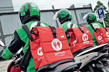 Indonesia-based online ride-hailing platform Gojek provides custom bags and uniforms for drivers using the platform’s food delivery service, GoFood. (GOJEK)