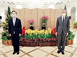 Yang Jiechi (left), member of the Political Bureau of the CPC Central Committee and director of the Office of the Foreign Affairs Commission of the CPC Central Committee, poses with Singaporean Prime Minister Lee Hsien Loong in the Istana on August 20. (MINISTRY OF COMMUNICATIONS AND INFORMATION OF SINGAPORE)