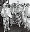 On April 15, 1960, Premier Zhou Enlai (first left) and Vice Premier Chen Yi (sunglasses) attend the Thingyan Festival celebration to kick off their visit to Myanmar. (DU XIUXIAN)