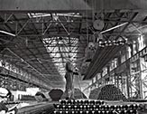 Steel rails produced by the first rolling mill of Anshan Iron and Steel in April 1957, where production boomed during China’s first Five-Year Plan period (1953-1957). (XINHUA)