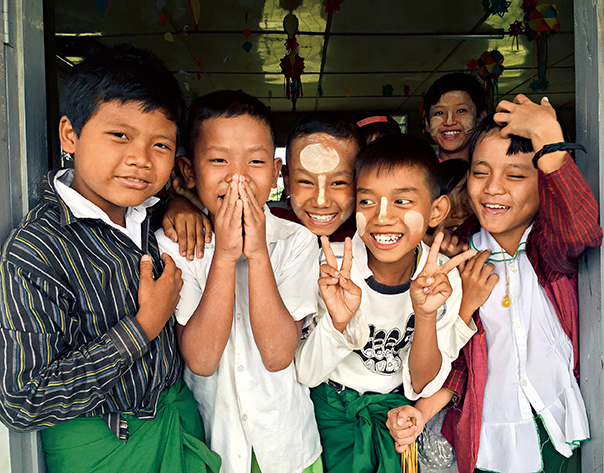 Students waiting for “panda packs”in a classroom in Shan State，Myanmar.